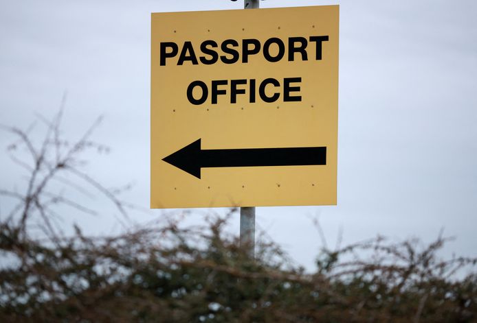 Signage is seen near the entrance of the Passport Office in Liverpool, Britain, March 20, 2023. REUTERS/Phil Noble