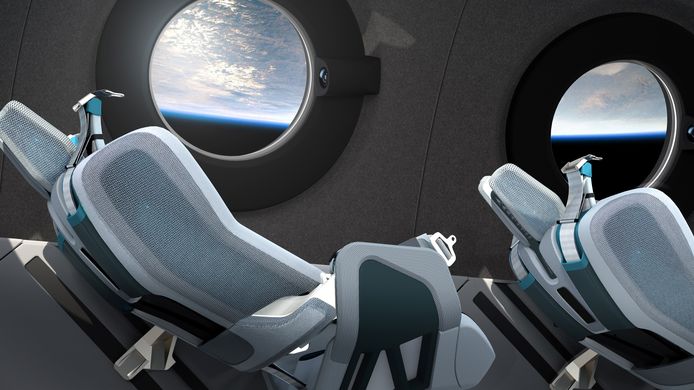 Zo zal het ruimteschip van Virgin Galactic er aan de binnenkant uitzien, met het nodige comfort voor de passagiers.