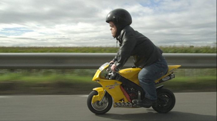 Chris Willemsen on his pocket bike in 'De Ronde'.