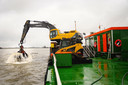 Toen er nog volop slib werd gestort in de plas van de Kaliwaal.