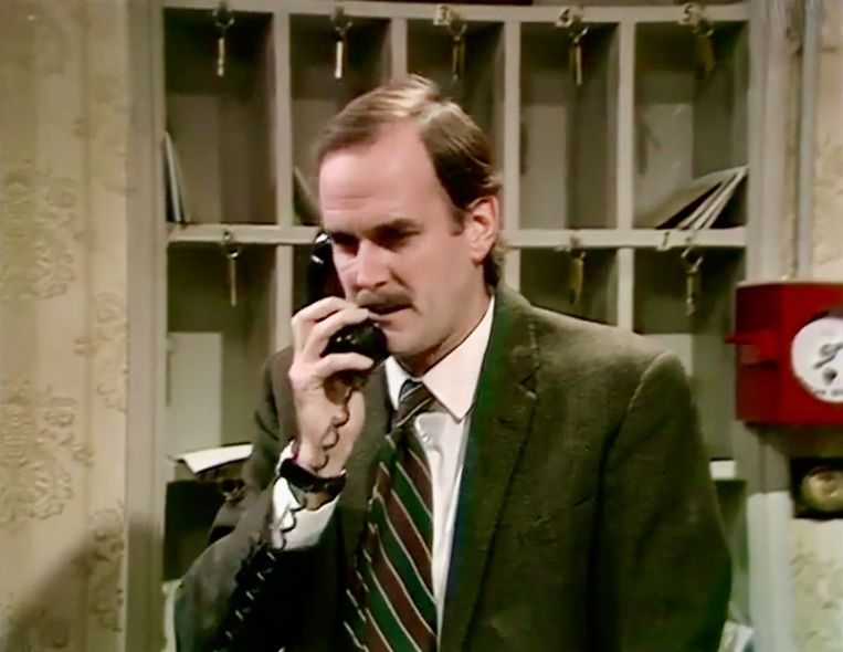 John Cleese als hoteleigenaar Basil Fawlty. Beeld 