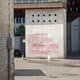 Stad Gent dient klacht in na graffiti met namen Reuzegommers op stadshal