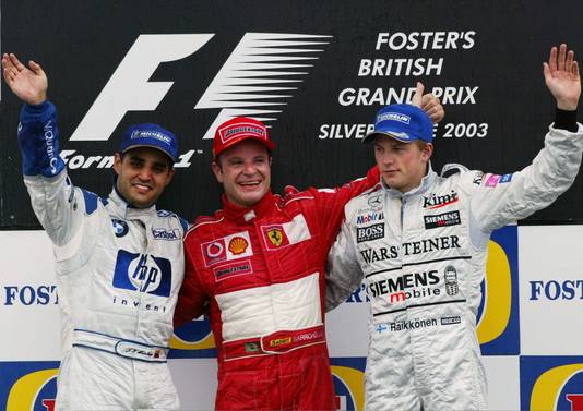 Barrichello in het midden, geflankeerd door rechts Kimi Räikkönen en links Juan Pablo Montoya. 