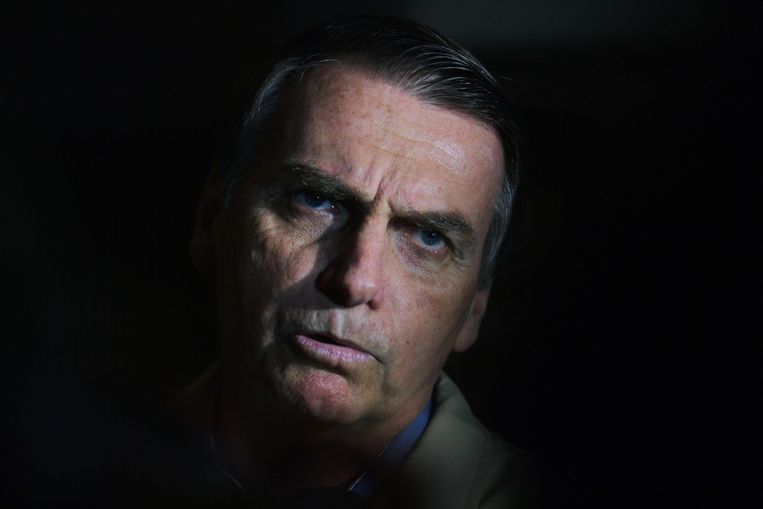 President Jair Bolsonaro voert een nietsontziende oorlog tegen criminaliteit. Beeld AFP