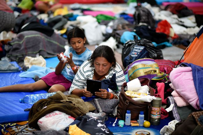 Migranten op weg naar de VS rusten uit in Mexico-stad.