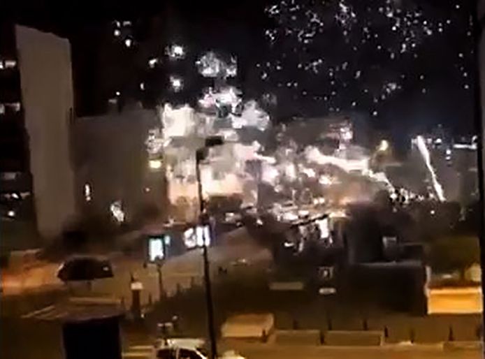 A photo of the storming of the police station of Champigny-sur-Marne last night.  Forty young rioters attempted to enter the police station with fireworks and metal bars.