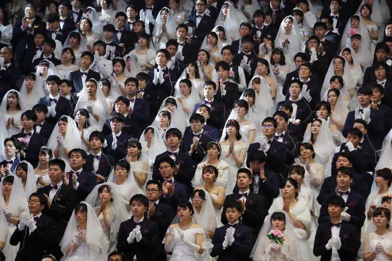 Een massale bruiloft van volgelingen van de Verenigingskerk, of Moon-sekte, in Zuid-Korea.  Beeld AP