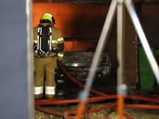 Auto en garage verwoest door brand in Boxtel