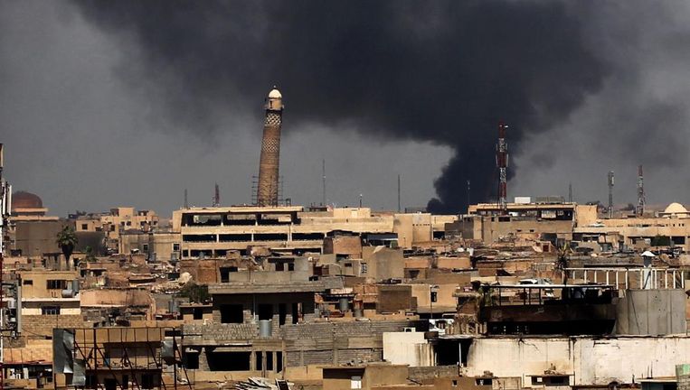 Mosul, met op de achtergrond de scheve al-Hadba minaret van de Al-nuri-moskee. Beeld anp