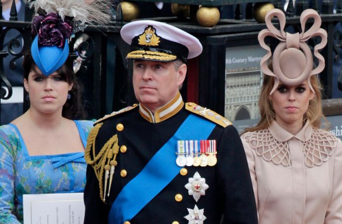 Prins Andrew met zijn dochters Eugenie en Beatrice.