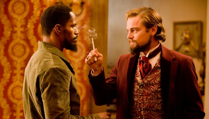 Jamie Foxx als Django met Leonardo DiCaprio als Calvin Candle .
