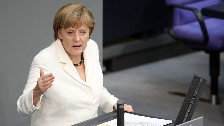 Angela Merkel zwichtte. Beeld AFP