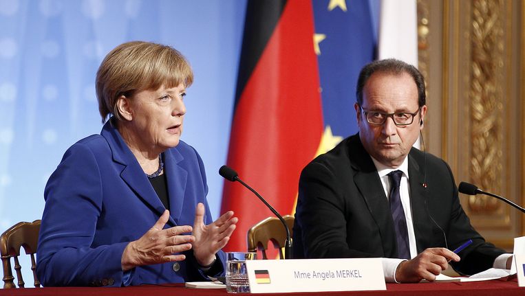Bondskanselier Angela Merkel met de Franse president François Hollande. Beeld GETTY