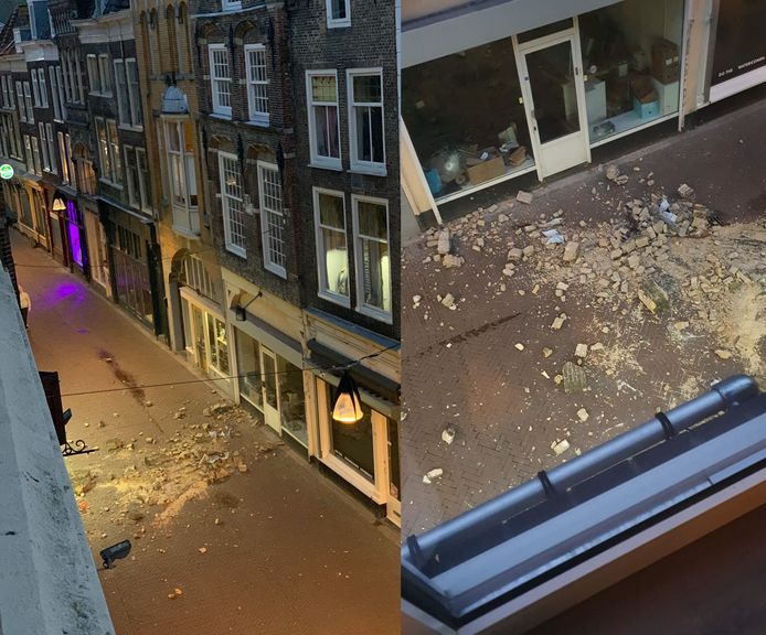 Op de Voorstraat-Midden in Dordrecht ligt puin op straat. Losgekomen door de storm.