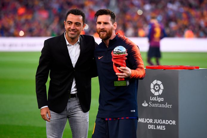 Xavi en Lionel Messi op 20 mei 2018.