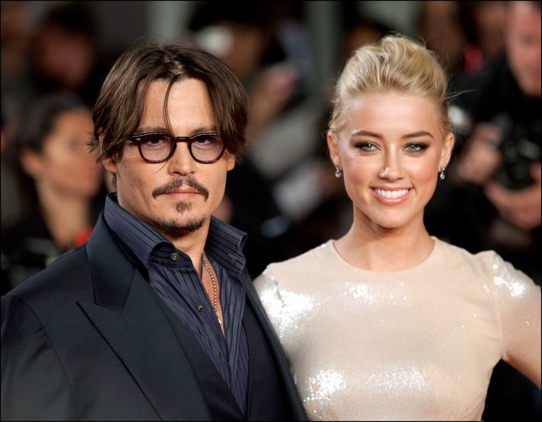 Johnny Depp en Amber Heard tijdens de Europese première van 'The Rum Diary' in London, 2011.  Beeld Photo News