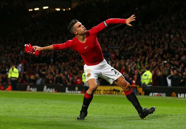 Robin van Persie viert zijn late gelijkmaker voor Manchester United. Beeld getty