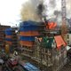 Grote brand in centrum, vermoedelijke stichter van dak gesprongen