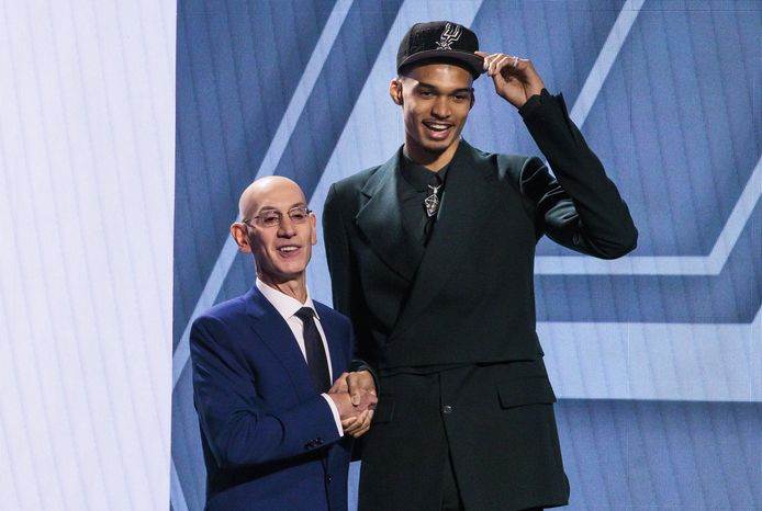 Victor Wimbanyama with NBA President Adam Silver.