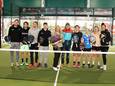 De finalisten bij dames en heren van de Belgian Padeltour met in het midden Kim en Jeremie van Chalet Radar.
