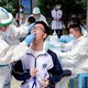 Door ‘sluimerende covid’ is quarantaine in China een eindeloze oefening in geduld