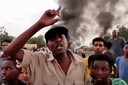 Protesten in Khartoem, Soedan, op maandag 25 oktober 2021. Er is een couppoging gaande in het land. (New Sudan NNS via AP)