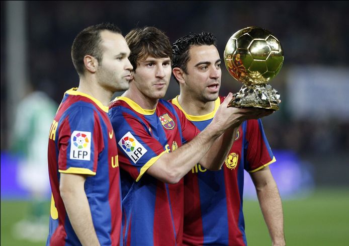 Iniesta, Messi en Xavi in januari 2011.