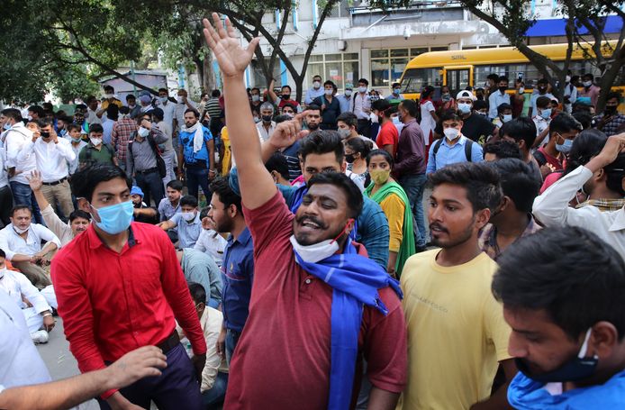 Demonstranten in Delhi demonstreren naar aanleiding van de groepsverkrachting en dood van een 19-jarige vrouw.