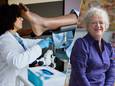 Female gynecologist doctor obtaining a cervical smear / Mieke Kerkhof