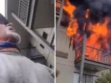 Passerende hardloper helpt vrouw om uit brandende hotelkamer te springen