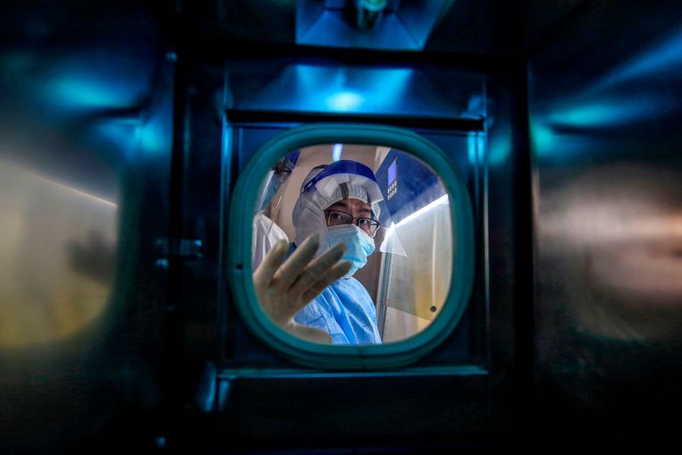 Wie geen vaccin neemt, raakt in China zijn groene code kwijt. Beeld AFP