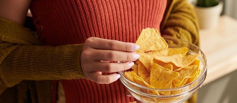 Verslaafd aan zout eten? Dit kan het over je gezondheid zeggen Beeld Getty Images