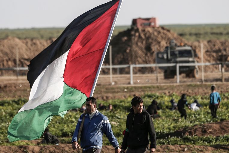 Palestijnse demonstranten bij Gaza. Beeld AFP