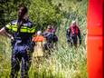 Duikers van de brandweer stonden al op het punt te water te gaan toen bleek dat het om een vals alarm ging.