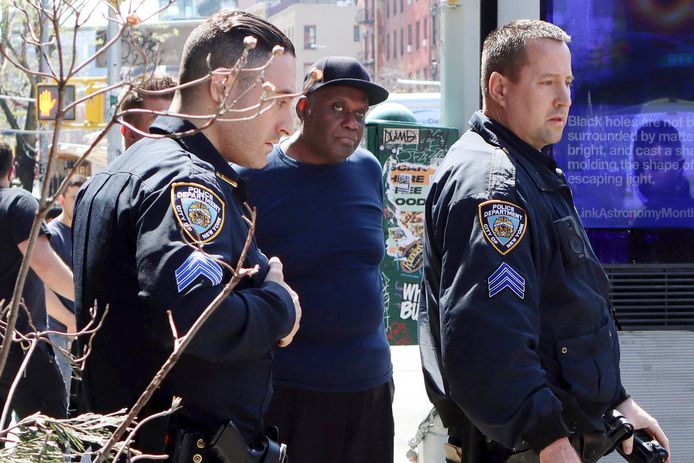 Suspect Frank R. James after his arrest on the street in Manhattan's East Village.