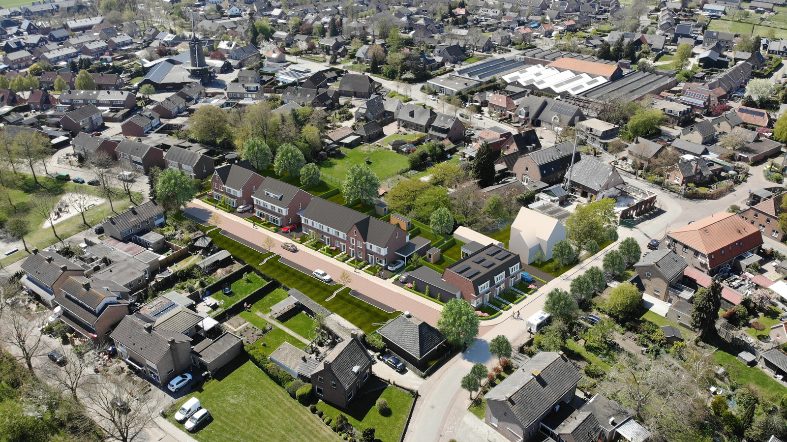 Impressie van de twaalf projectwoningen die volgend jaar in Megen gaan verschijnen. Op de voorgrond, naar rechts, de Walstraat.