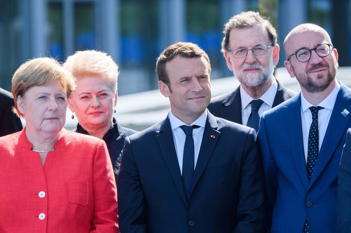 De Duitse bondskanselier Angela Merkel, de Franse president Emmanuel Macron en Charles Michel, sinds 1 december voorzitter van de Europese Raad.