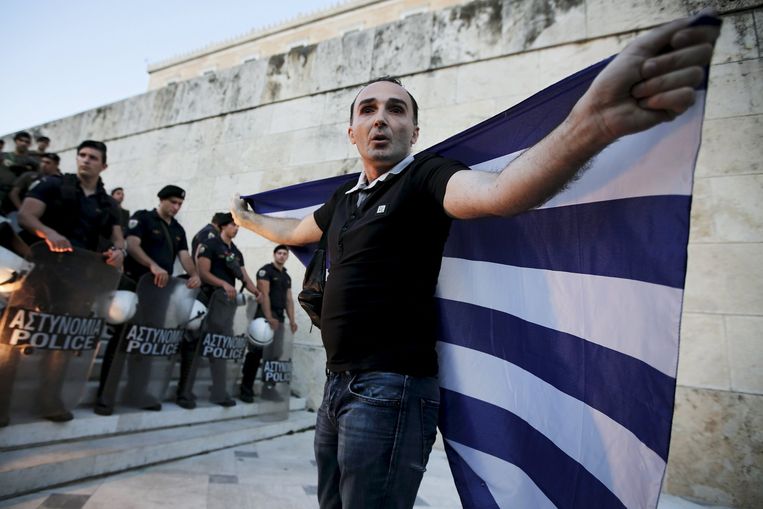 Een anti-EU demonstrant in Athene. Beeld reuters