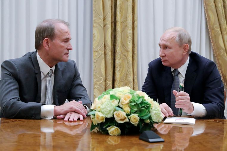 Viktor Medvedtsjoek en de Russische president Vladimir Poetin.  Beeld REUTERS