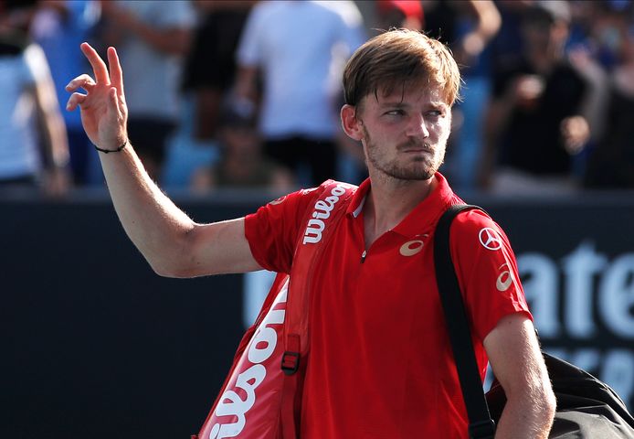 Belgium's David Goffin waves as he walks from the court following his third round loss to Russia's Andrey Rublev at the Australian Open tennis championship in Melbourne, Australia, Saturday, Jan. 25, 2020. (AP Photo/Andy Wong)