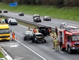 Ravage op A50 na botsing met vier voertuigen bij Son en Breugel, één voertuig in brand