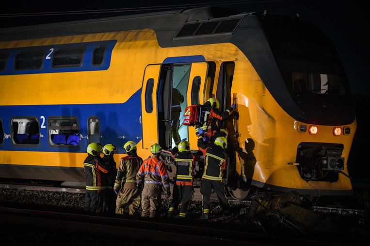 Emergency services on a train that has derailed.  ANP image