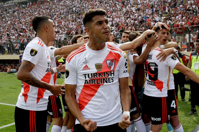 Exequiel Palacios of Argentina's River Plate celebrates his side's opening goal against Brazil's Flamengo, scored by Rafael Borre, during the Copa Libertadores final soccer match at the Monumental stadium in Lima, Peru, Saturday, Nov. 23, 2019. (AP Photo/Fernando Vergara)