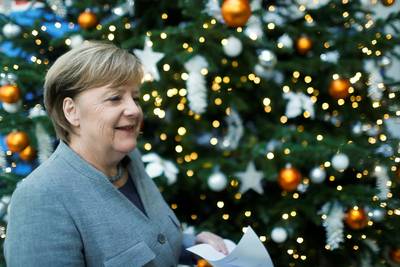 Merkel ontvangt nabestaanden aanslag Berlijn na lading kritiek