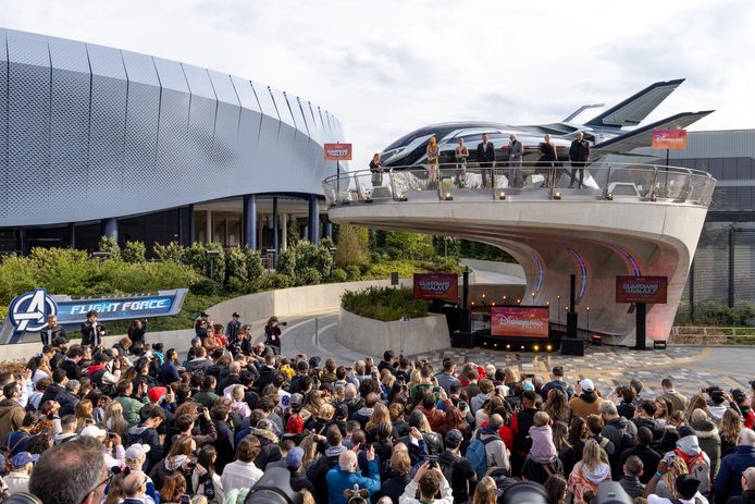 Karen Gillan, Zoe Saldana, Chris Pratt, director James Gunn, Pom Klementieff and Vin Diesel pose in front of the Quinjet, the Avengers' signature aircraft located on the Marvel Avengers campus.