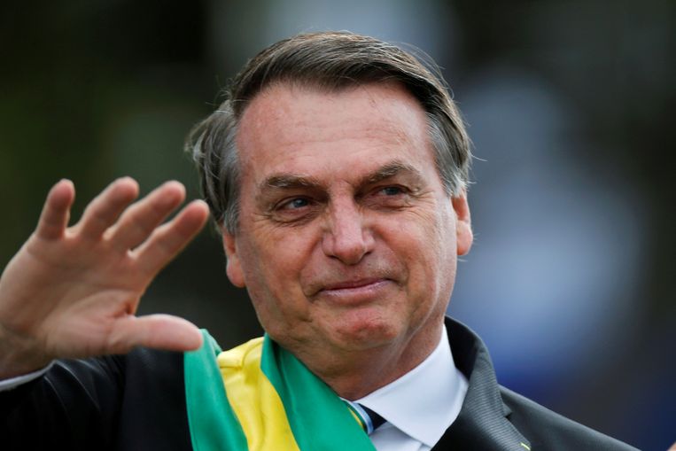 Braziliaans president Bolsonaro zou lastpost Greenwald het liefst meteen het land uitzetten. Beeld REUTERS