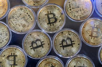 Le bitcoin dépasse les 70.000 dollars, nouveau record historique