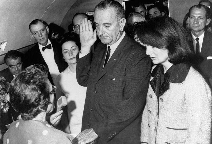 Vice President Lyndon Johnson was sworn in as the 36th President of the United States just hours after Kennedy's assassination.  It happened on Air Force One, which was still at Dulles Airport.  Jackie Kennedy surrounds the new president.