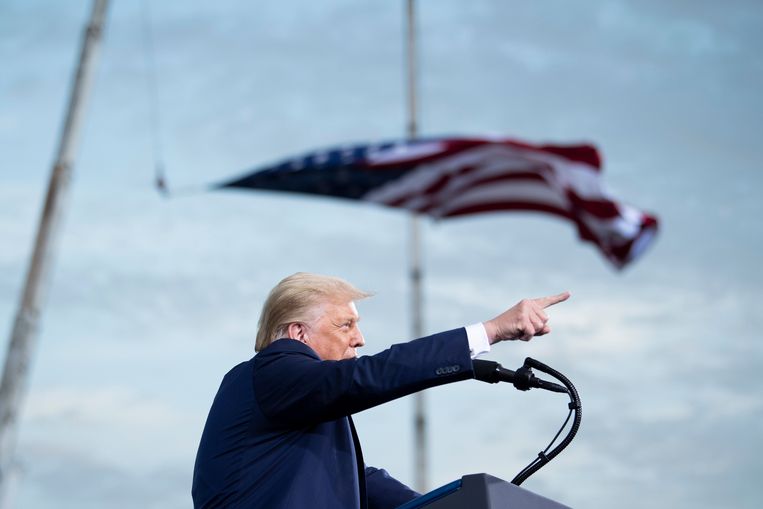 President Trump tijdens een verkiezingsbijeenkomst.  Beeld AFP