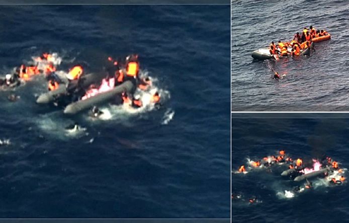 De vluchtelingen springen in paniek in zee als vlammen bezit nemen van hun bootje.